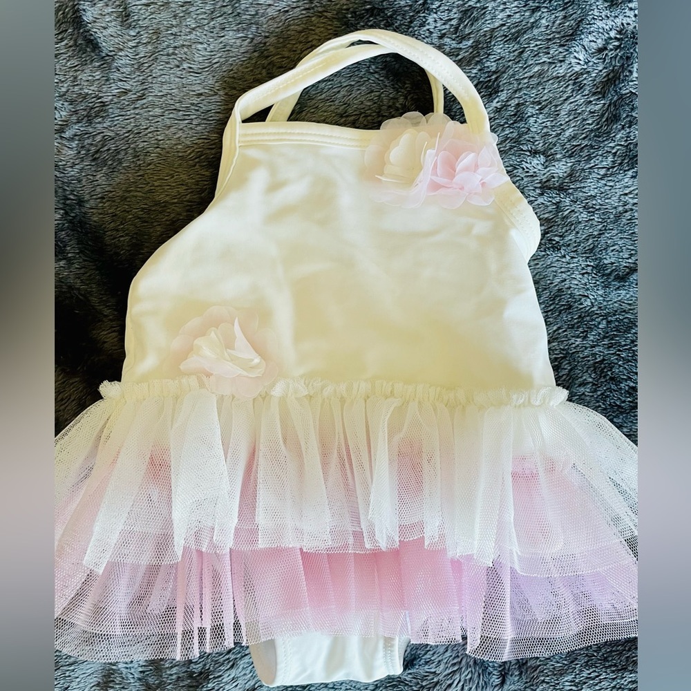 Adorable swimsuit size 3-6M with ruffles